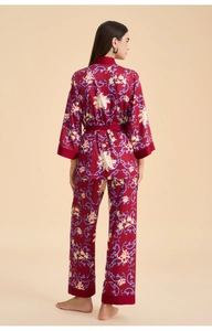 Detail of floral printed satin pajama set with kimono sleeves and matching pants