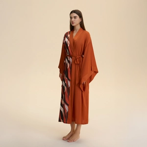 Luxury burnt orange satin robe for women featuring abstract flame pattern and kimono sleeves