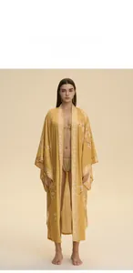 Golden floral print kimono robe with wide sleeves and bird motifs on chiffon fabric