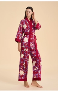 Detail of silk-satin floral pajama set with kimono wrap top and long trousers