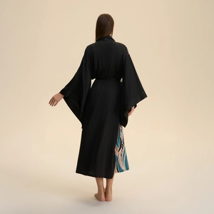 Elegant long black satin kimono robe for women with geometric print detail on the back view