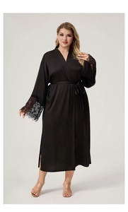 Detail of black satin bathrobe featuring elegant lace sleeves and a matching waist tie