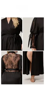 Close-up of black satin robe featuring delicate lace sleeves and elegant side slit detail