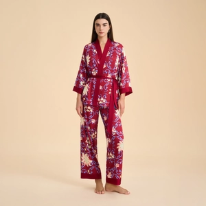 Women's burgundy floral satin pajama set with wrap-style long sleeves and wide-leg pants