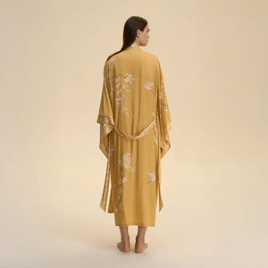 Yellow floral kimono robe with crane print and adjustable waist belt, back view shot