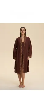 Detail of deep brown robe set with vintage print trim and matching dress for loungewear