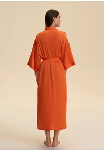 Rear view of long bright orange satin robe with wide sleeves and matching silk waist belt