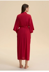 Back view of a long red satin kimono robe with elegant draping and a silk-like texture