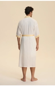 Rear view of white satin robe for men featuring yellow geometric trim on waist and cuffs
