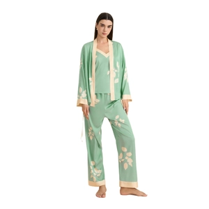 Three-piece mint green satin pajama set with floral leaves pattern and kimono robe