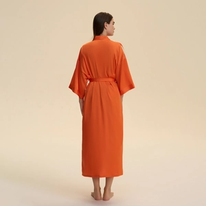 Elegant orange satin long kimono robe with wide sleeves and belt seen from back