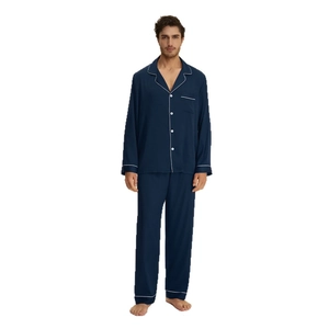 Men's navy satin pajama set with long sleeves and white piping trim on a plain background