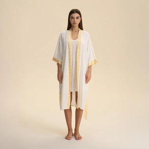 Women's satin lounge robe set with yellow geometric trim and white camisole dress