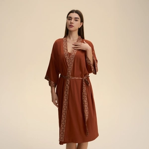 Elegant caramel satin kimono bathrobe for women with vintage floral trim and waist belt