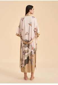 Detailed back view of long-sleeved floral print kimono robe with elegant gold trim and belt