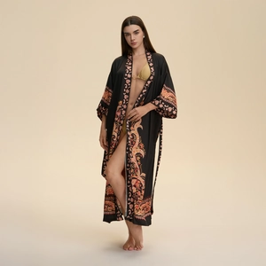 Elegant long floral kimono nightdress in black silk-like fabric with paisley print