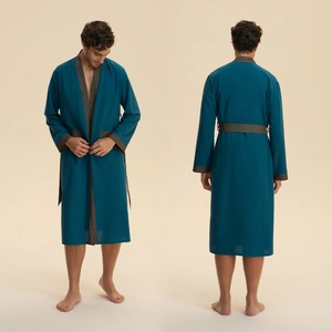 Men's teal long-sleeve robe in soft cloud cotton with geometric patterns on collar and cuffs