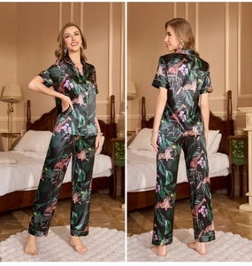 Detail of short sleeve silk pajamas featuring exotic jungle animal and floral prints
