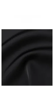 Close-up of premium black silk fabric showing smooth texture and soft drape detail