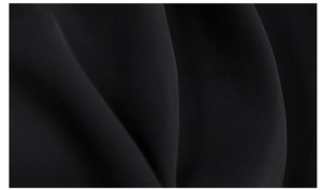 Vue macro de la texture du tissu sergé noir de haute qualité pour pyjama de femme