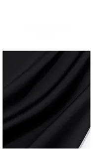 Detail view of premium black pajamas fabric with smooth texture and soft matte finish