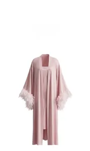Detailed view of dusty pink silk robe with feather cuffs and matching slip dress