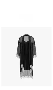 Detail view of black silk slip dress and sheer mesh robe with white floral lace trim