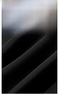 Detailed macro view of high-quality black chiffon fabric texture for women's bathrobe