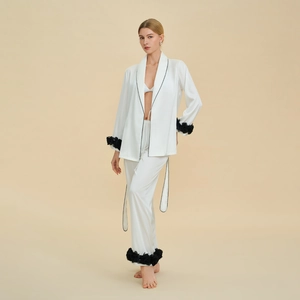 Elegant white satin pajama set with black floral details and long sleeves for women