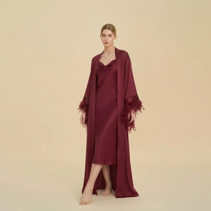 Elegant burgundy satin sleepwear set with feather trim sleeves and cowl neck dress