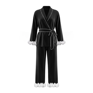 Elegant black satin pajama set with long sleeves and white floral appliques on cuffs