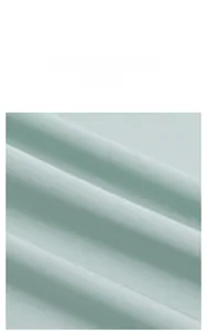 Detailed macro view of mint green luxurious silky fabric for bridesmaid robes