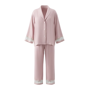 Pink silk-like loungewear set with elegant lace cuffs and trousers in French luxury style
