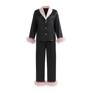 Luxury black satin pajama set with pink detachable feather trim and elegant notched lapels