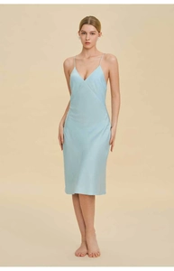 Close-up of light blue satin slip dress showing V-neckline and fine spaghetti straps