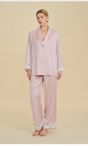 French luxury pale pink satin pajama set with long sleeves and elegant lace details
