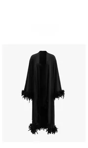 Luxurious long black satin robe with elegant feather trim on the sleeves and hemline