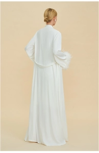 Elegant white satin robe back view featuring luxurious feather cuffs and floor-length design