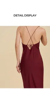 Close-up of wine red satin nightgown featuring backless design with cross straps