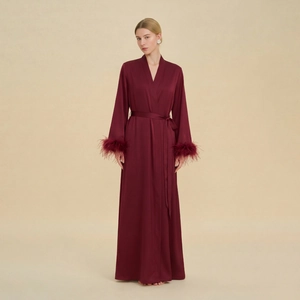 Luxurious burgundy silk bathrobe for women featuring detachable feather cuffs and waist tie