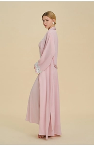 Pink satin lounge set featuring robe with delicate lace cuffs and matching trousers