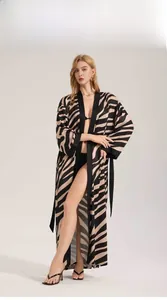 Detailed view of zebra print chiffon robe with lace sleeves and matching waist tie