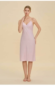 Detail showing the smooth silk texture and thin straps of the light purple V-neck sleepwear