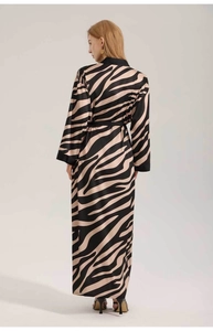 Rear view of full-length zebra print chiffon robe with long sleeves and black belt
