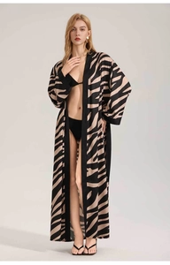 Detailed view of the zebra print chiffon cover-up with long sleeves and ankle length