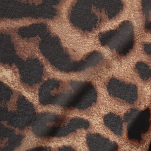 Motif léopard animal détaillé sur la texture du tissu de luxe pour vêtements d'intérieur