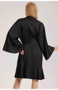 Rear view of black satin bathrobe featuring elegant ruffle hem and flared sleeves