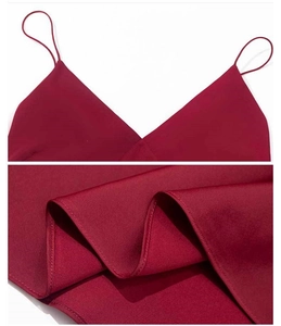 Detail of burgundy satin sleepwear featuring a V-neckline and fine stitching craft