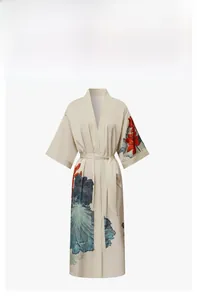 Detailed view of satin floral bathrobe with elegant red lotus and wide cuffs