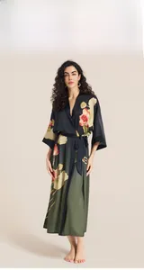 Detail of satin floral kimono robe with lotus print and elegant V-neckline tie-waist